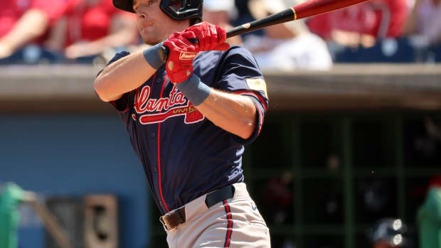 Feb 28, 2024; Clearwater, Florida, USA; Atlanta Braves pitcher Jordan Luplow (72) doubles during the second inning against the Philadelphia Phillies at BayCare Ballpark.